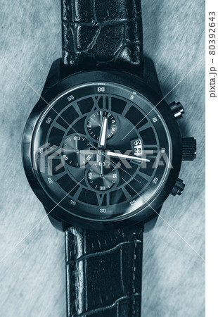 Business wristwatch on the wooden table Business wristwatch on the wooden table 80392643