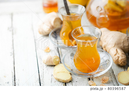 Ginger tea in a glass cup Ginger tea in a glass cup 80396587