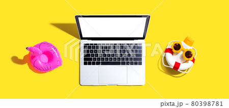 Laptop computer with summer theme items 80398781