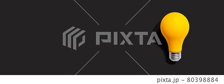 Yellow light bulb 80398884