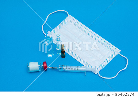 A syringe and ampoules. Vaccination A syringe and ampoules. Vaccination 80402574