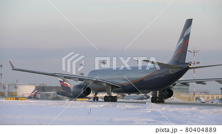 Aeroflot aircraft A330 taxiing in Moscow airport, winter view 80404889