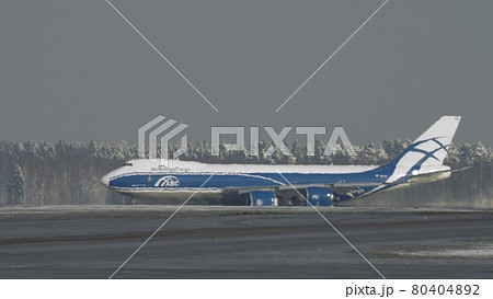 Winter view of freighter Boeing 747 taxiing Winter view of freighter Boeing 747 taxiing 80404892
