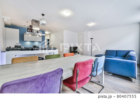Bright dining room with decorative table and chairs 80407555