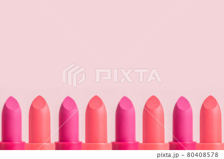 Lipstick border on pink background with copy space.  80408578