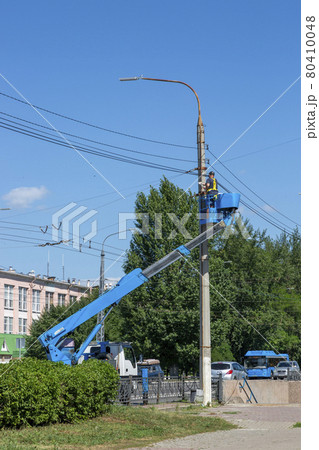Belgorod, Russia - July 08, 2021: Repair work on the power line in Belgorod Belgorod, Russia - July 08, 2021: Repair work on the power line in Belgorod 80410048
