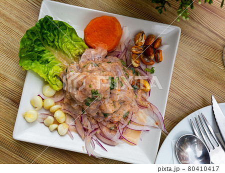 Seafood ceviche from hake with onion and vegetables Seafood ceviche from hake with onion and vegetables 80410417