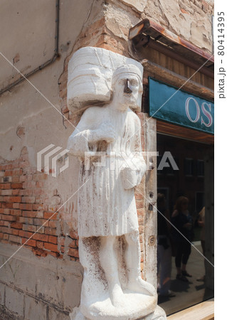venetian ancient medieval statue with iron nose 80414395