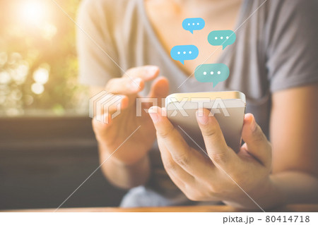 Woman using mobile smartphone 80414718