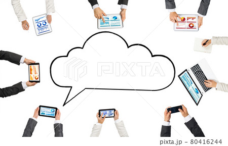 Top view of businesspeople sitting at table and using gadgets Top view of businesspeople sitting at table and using gadgets 80416244