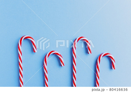Christmas candy canes and fir branches flat lay Christmas candy canes and fir branches flat lay 80416636
