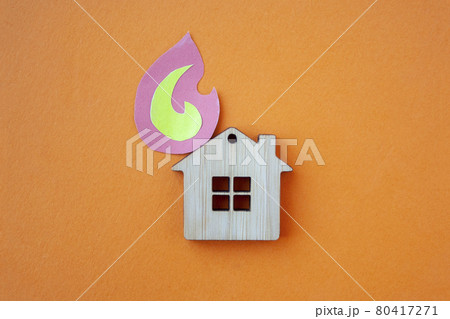 Fire house, insurance and mortgage concept. Small wooden house 80417271