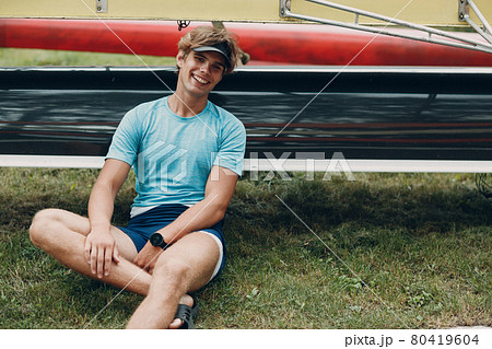 Sportsman single scull man rower prepare to competition boat regatta. Olympic games sport. 80419604
