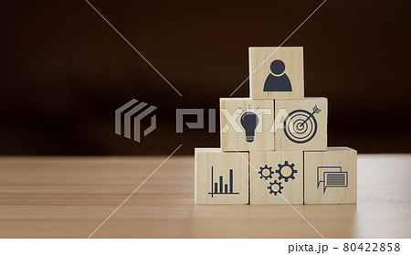 Close up of wood block with business and finance icon background concept. Human resource management, Strategy target planning , Success and synergy plan, Innovation creative new idea financial. Close up of wood block with business and finance icon background concept. Human resource management, Strategy target planning , Success and synergy plan, Innovation creative new idea financial. 80422858