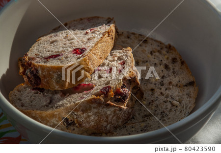 Cranberry walnut bread in a white bowl Cranberry walnut bread in a white bowl 80423590