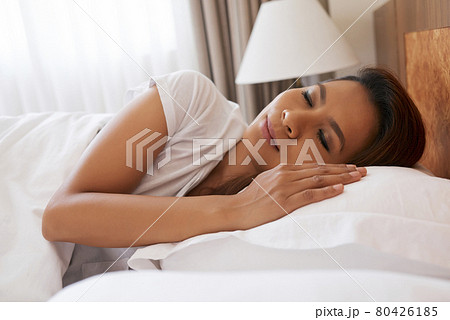 Woman Sleeping on Comfy Pillow Woman Sleeping on Comfy Pillow 80426185