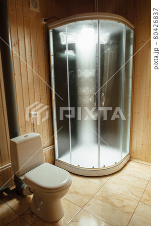 modern shower cabin with illumination and toilet 80426837