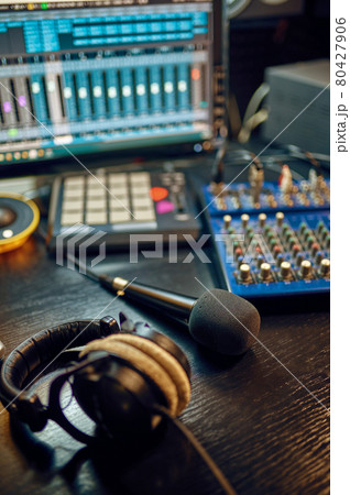 Headphones on the table, recording studio interior Headphones on the table, recording studio interior 80427906