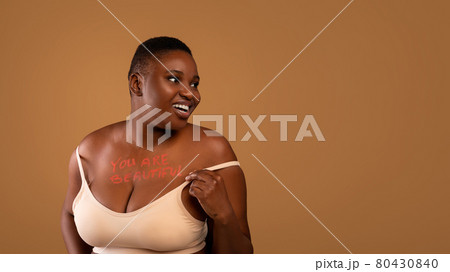 Portrait Of Curvy Smiling Black Woman In Underwear Posing Stock Photo by  ©Milkos 507512368