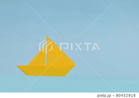 Yellow Paper boat On Blue Background 80432918