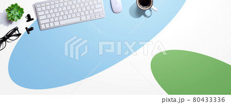 Computer keyboard with a cup of coffee and eyeglasses 80433336