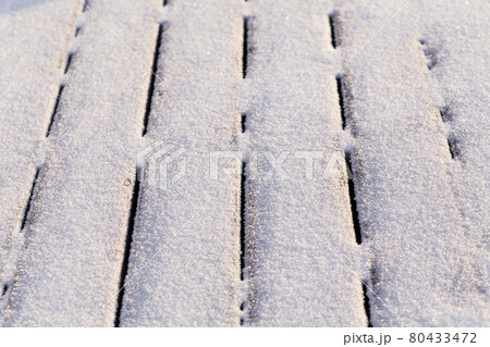 Snow covered wood terrace Snow covered wood terrace 80433472
