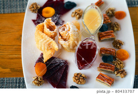 Various Sweets dried fruits, baklava in the cafe Various Sweets dried fruits, baklava in the cafe 80433707