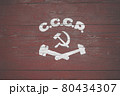 Soviet painted coat of arms. Hammer and sickle drawn on wooden boards 80434307