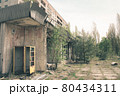 Abandoned building in Pripyat. Broken call-box or telephone box 80434311