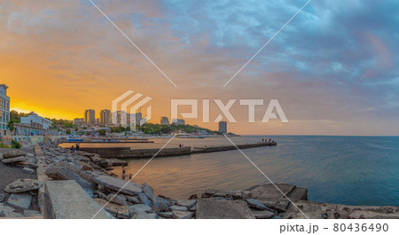 panoramic view of the black sea, beaches and buildings in the Arcadia quarter in Odessa at sunset 80436490