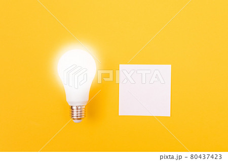 A Power Saving Lamp with White Note Paper A Power Saving Lamp with White Note Paper 80437423