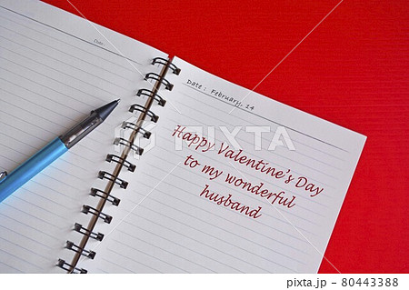 Text on white notepad with red background. Top view and Valentine's day concept Text on white notepad with red background. Top view and Valentine's day concept 80443388