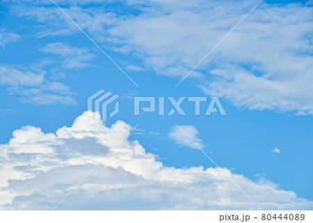 Beautiful white clouds on blue sky background. 80444089