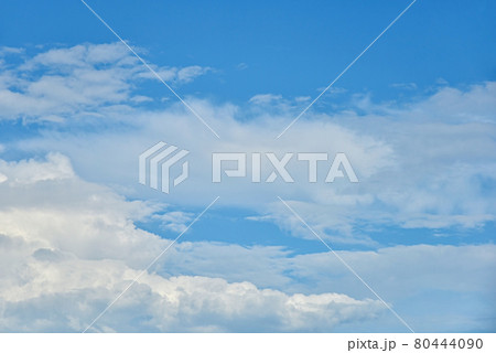 Beautiful white clouds on blue sky background. 80444090