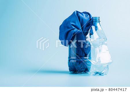 Polyester fiber synthetic fabrics eco-friendly textile recycled recyclable plastic bottles. Reuse recycling used bottles Polyester fiber synthetic fabrics eco-friendly textile recycled recyclable plastic bottles. Reuse recycling used bottles 80447417