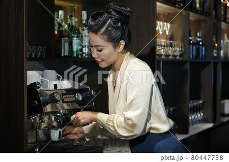 Restaurant Manager Making Coffee 80447738