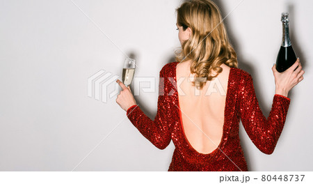 holiday drink elegant woman festive event party 80448737