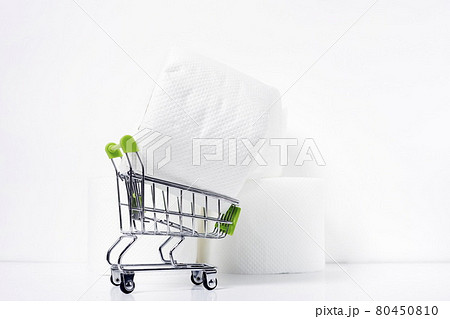 Three rolls of toilet paper and a cart 80450810
