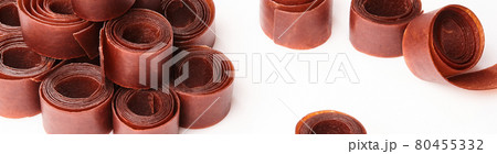 Traditional Georgian tklapi rolls on white background 80455332