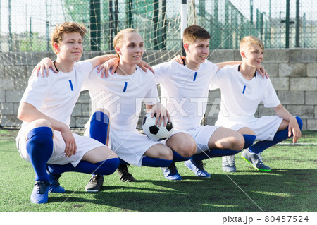 Group portrait of male soccer team 80457524