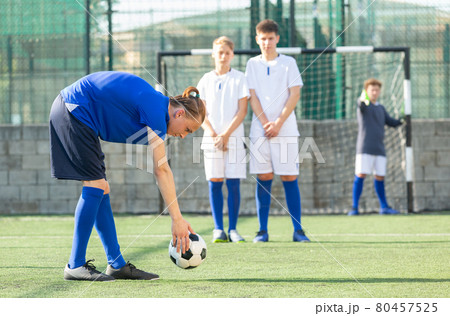 Two youth teams play football 80457525