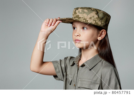 child girl wear military uniform. kid dressed like a soldier 80457791