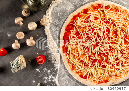 Semi finished pizza with cheese and tomato sauce 80460937