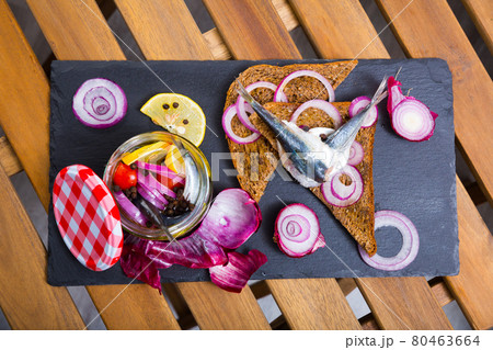 Fish dish - homemade pickling pilchards 80463664