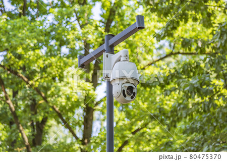 Small outdoor security camera on an iron pillar Small outdoor security camera on an iron pillar 80475370
