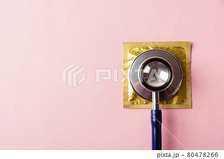medical equipment, condom in pack and stethoscope medical equipment, condom in pack and stethoscope 80478266