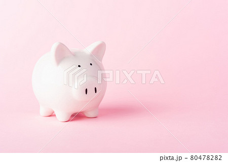Front small white fat piggy bank, studio shot isolated on pink 80478282