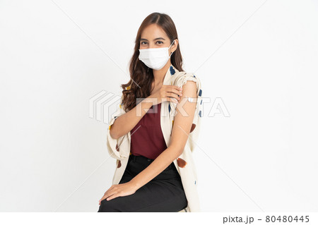 Asian Patient Getting Vaccinated Against Coronavirus by doctor 80480445