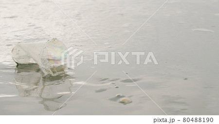 pet plastic cup on beach pet plastic cup on beach 80488190