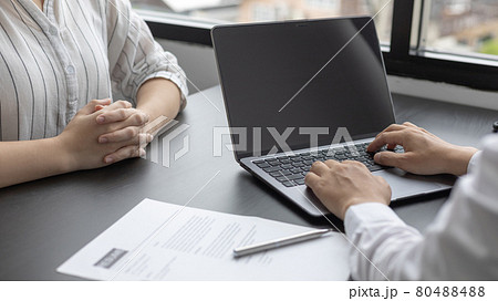 Job application, Employer or HR examines the applicant's information with a laptop to check their work history and ability to perform, Manager resource employment and recruitment. 80488488